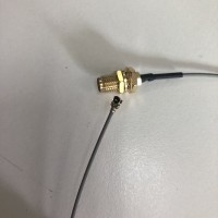 Gray 1.13mm Rf Coaxial Adapter Cable With Uf.l Brass Plug And Sealed Sma Fem. Bulkhead Mounted Connector